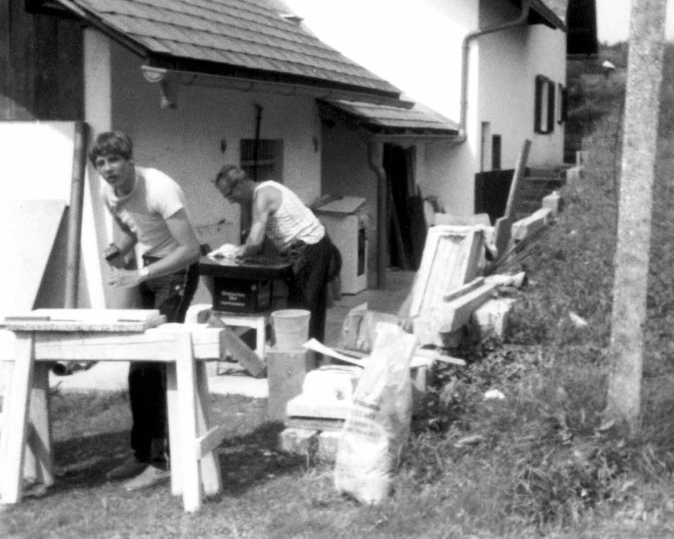Walter Pölzl engraving letters in his home workshop